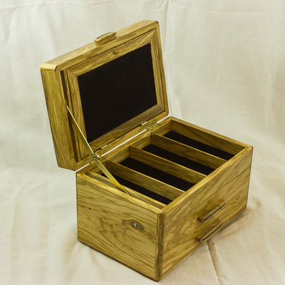 Jewellery box made from olive wood with hinged lid