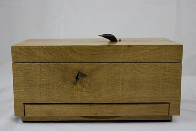 Front of solid oak block jewellery box by Reuben's woodcraft.